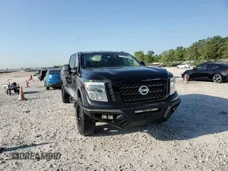 2016 Nissan Titan SL z VIN 1N6BA1F4XGN509402, wystawiony jako Copart lot #52410795 z przebiegiem 37 421 mil mil oraz Szkoda całkowita • Salvage title. Historia ofert i sprzedaży dostępna na DreamBid. Obrazek 13.