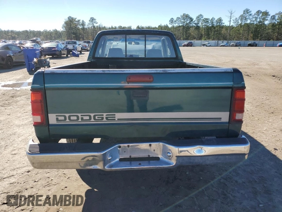 1995 Dodge Dakota z VIN 1B7GL23X3SS136589, wystawiony jako Copart lot #86889194 z przebiegiem 126 001 mil mil oraz Szkoda całkowita • Salvage title. Historia ofert i sprzedaży dostępna na DreamBid. Obrazek 6.