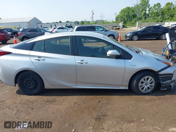 2022 Toyota Prius L Eco z VIN JTDKAMFU2N3165805, wystawiony jako IAAI lot #42428676 z przebiegiem 435 471 mil mil oraz . Historia ofert i sprzedaży dostępna na DreamBid. Obrazek 13.