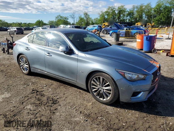 2018 Infiniti Q50 Luxe with VIN JN1EV7APXJM590569, listed as a Copart auction lot 55643215 with 86,965 mi miles and Salvage title. Bid and sale history available at DreamBid. Image 4.