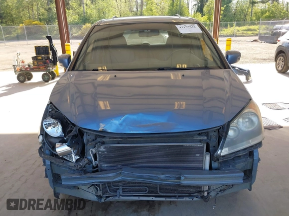 2010 Honda Odyssey EX-L with VIN 5FNRL3H61AB046416, listed as a IAAI auction lot 42157812 with 129,525 mi miles and . Bid and sale history available at DreamBid. Image 13.