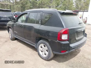 2014 Jeep Compass Sport with VIN 1C4NJCBA8ED844538, listed as a IAAI auction lot 41951190 with 157,000 mi miles. Bid and sale history available at carsss.com. Image 3.