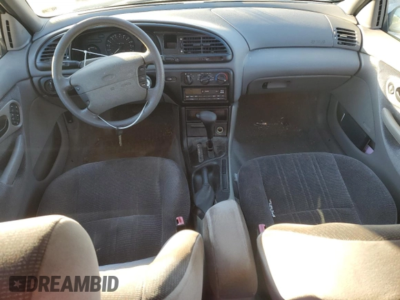 1997 Ford Contour with VIN 3FALP6535VM112253, listed as a Copart auction lot 80501924 with 116,778 mi miles and Salvage title. Bid and sale history available at DreamBid. Image 8.