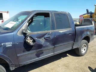 2001 Ford F-150 SuperCrew XLT with VIN 1FTRW08W81KF01853, listed as a IAAI auction lot 41850493 with 1 mi miles. Bid and sale history available at carsss.com. Image 14.