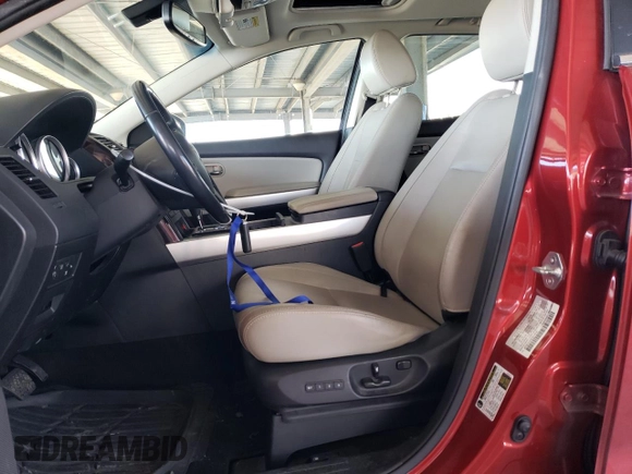 2014 Mazda CX-9 Grand Touring z VIN JM3TB2DVXE0439729, wystawiony jako Copart lot #49188875 z przebiegiem 113 839 mil mil oraz Szkoda całkowita • Salvage title. Historia ofert i sprzedaży dostępna na DreamBid. Obrazek 7.