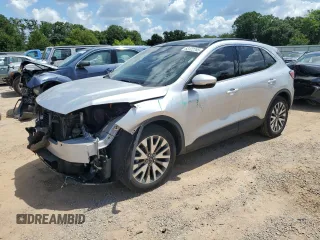 2020 Ford Escape Titanium Hybrid с VIN 1FMCU0DZ0LUB93771, выставлен на аукционе Copart как лот 63122765 с пробегом 100 145 миль миль и Списание • Salvage title. История ставок и продаж доступна на DreamBid. Изображение 1.