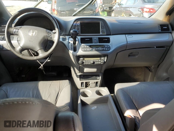 2008 Honda Odyssey EX-L z VIN 5FNRL387X8B079823, wystawiony jako Copart lot #55638755 z przebiegiem 211 173 mil mil oraz Szkoda całkowita • Salvage title. Historia ofert i sprzedaży dostępna na DreamBid. Obrazek 8.