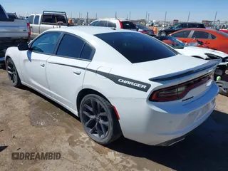 2020 Dodge Charger SXT with VIN 2C3CDXBG9LH136457, listed as a IAAI auction lot 41585590 with 61,390 mi miles and . Bid and sale history available at DreamBid. Image 3.