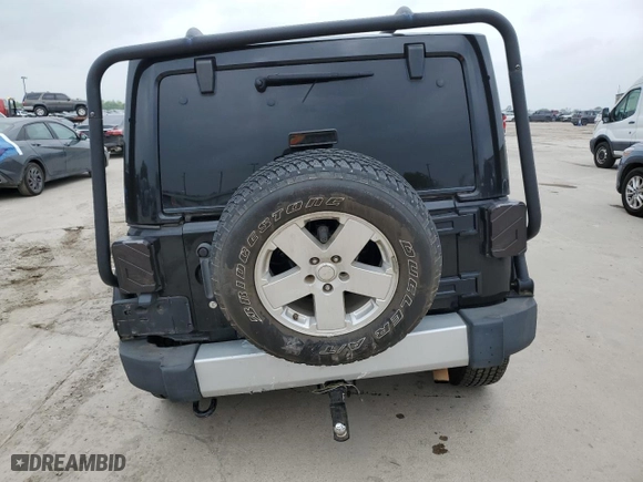 2011 Jeep Wrangler Unlimited Sahara with VIN 1J4HA5H13BL546703, listed as a Copart auction lot 51521845 with 127,132 mi miles and Salvage Title. Bid and sale history available at carsss.com. Image 6.