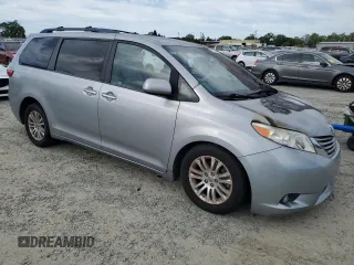 2015 Toyota Sienna XLE with VIN 5TDYK3DC4FS672992, listed as a Copart auction lot 52775715 with Not Provided miles and Non Repairable. Bid and sale history available at DreamBid. Image 4.