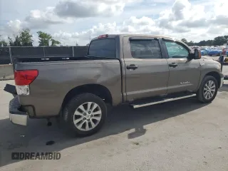 2012 Toyota Tundra z VIN 5TFDW5F14CX216264, wystawiony jako Copart lot #60983285 z przebiegiem 186 869 mil mil oraz Szkoda całkowita • Salvage title. Historia ofert i sprzedaży dostępna na DreamBid. Obrazek 3.