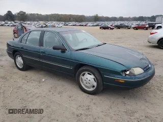 1997 Chevrolet Lumina LS with VIN 2G1WL52M3V9163567, listed as a Copart auction lot 82772324 with 191,852 mi miles and Salvage Title. Bid and sale history available at DreamBid. Image 4.
