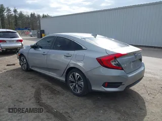 2018 Honda Civic EX-T z VIN 2HGFC1F34JH641837, wystawiony jako IAAI lot #41858089 z przebiegiem 65 318 mil mil oraz . Historia ofert i sprzedaży dostępna na DreamBid. Obrazek 3.