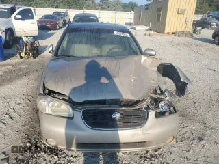 2001 Nissan Maxima GXE z VIN JN1CA31D11T828767, wystawiony jako Copart lot #69504024 z przebiegiem 177 431 mil mil oraz Szkoda całkowita • Salvage title. Historia ofert i sprzedaży dostępna na DreamBid. Obrazek 5.