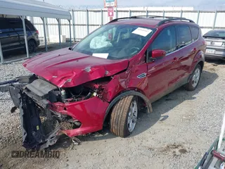 2013 Ford Escape SE with VIN 1FMCU0G9XDUB68342, listed as a IAAI auction lot 41541957 with 149,911 mi miles and . Bid and sale history available at DreamBid. Image 2.