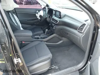 2021 Hyundai Tucson Sport with VIN KM8J3CAL6MU411855, listed as a IAAI auction lot 41694634 with 67,779 mi miles. Bid and sale history available at carsss.com. Image 5.