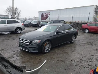 2018 Mercedes-Benz E with VIN WDDZF4KB5JA352116, listed as a IAAI auction lot 41863109 with 71,039 mi miles. Bid and sale history available at carsss.com. Image 2.