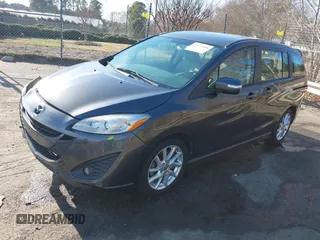 2014 Mazda 5 Touring with VIN JM1CW2CL3E0169367, listed as a IAAI auction lot 41673896 with 137,244 mi miles. Bid and sale history available at carsss.com. Image 2.