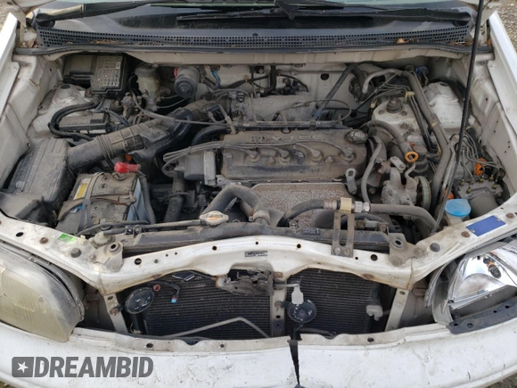 1998 Honda Odyssey with VIN RA31038664, listed as a Copart auction lot 43051785 with 106,084 mi miles and Salvage title. Bid and sale history available at DreamBid. Image 12.