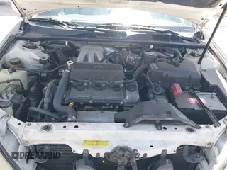 2002 Toyota Camry XLE z VIN 4T1BF32K42U035090, wystawiony jako IAAI lot #42250135 z przebiegiem 176 364 mil mil oraz . Historia ofert i sprzedaży dostępna na DreamBid. Obrazek 10.