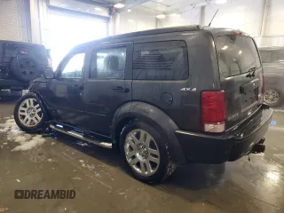 2010 Dodge Nitro SE with VIN 1D4PU2GK3AW144889, listed as a Copart auction lot 84314234 with 115,419 mi miles and Non Repairable. Bid and sale history available at DreamBid. Image 2.