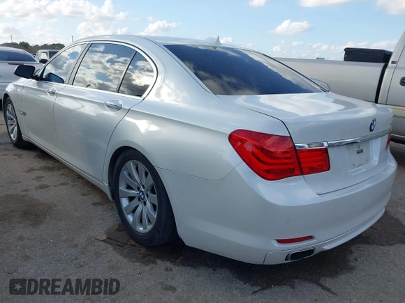 2011 BMW 7 Series 750Li with VIN WBAKB8C57BCY66558, listed as a IAAI auction lot 41494697 with 102,560 mi miles. Bid and sale history available at carsss.com. Image 3.
