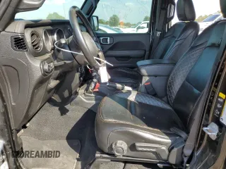 2021 Jeep Wrangler Unlimited Sahara High Altitude with VIN 1C4HJXEG7MW537997, listed as a Copart auction lot 74322054 with 60,226 mi miles and Salvage title. Bid and sale history available at DreamBid. Image 7.