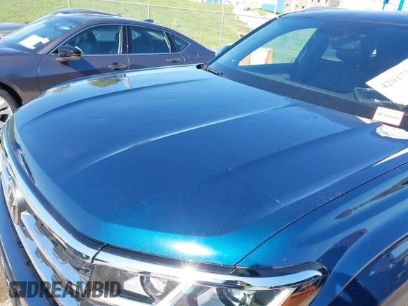 2021 Volkswagen Atlas SE z VIN 1V2KE2CA7MC220524, wystawiony jako IAAI lot #42017287 z przebiegiem 29 380 mil mil oraz . Historia ofert i sprzedaży dostępna na DreamBid. Obrazek 6.