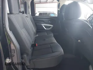 2018 Nissan Titan SV with VIN 1N6AA1E63JN512230, listed as a IAAI auction lot 42000705 with 64,479 mi miles and . Bid and sale history available at DreamBid. Image 8.
