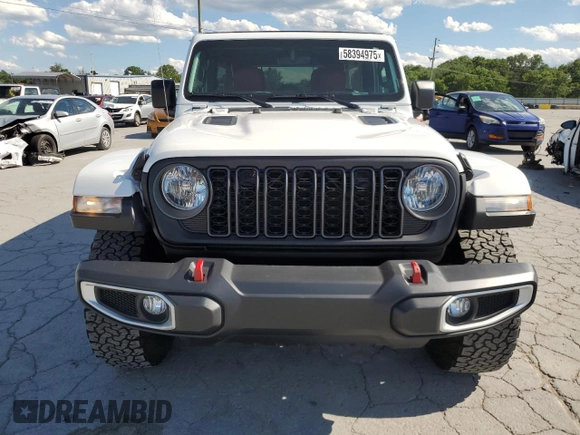 2021 Jeep Wrangler Unlimited Rubicon z VIN 1C4HJXFN1MW749453, wystawiony jako Copart lot #58394975 z przebiegiem 23 394 mil mil oraz Czysty tytuł • Clean title. Historia ofert i sprzedaży dostępna na DreamBid. Obrazek 5.