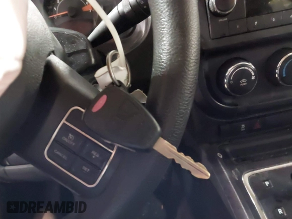 2014 Jeep Patriot Sport with VIN 1C4NJPBA1ED553340, listed as a IAAI auction lot 41212383 with 119,819 mi miles and . Bid and sale history available at DreamBid. Image 11.