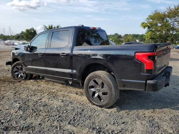 2024 Ford F-150 Lightning LARIAT with VIN 1FT6W5L73RWG03162, listed as a Copart auction lot 71613234 with 1,651 mi miles and Salvage Title. Bid and sale history available at carsss.com. Image 2.