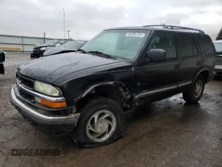 2001 Chevrolet Blazer LS z VIN 1GNDT13W312214377, wystawiony jako Copart lot #86285754 z przebiegiem 251 571 mil mil oraz Szkoda całkowita • Salvage title. Historia ofert i sprzedaży dostępna na DreamBid. Obrazek 1.