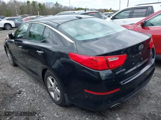 2015 Kia Optima LX with VIN 5XXGM4A75FG465435, listed as a IAAI auction lot 41738703 with 196,915 mi miles. Bid and sale history available at carsss.com. Image 3.
