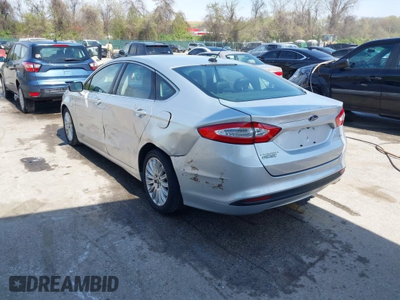 2016 Ford Fusion Energi SE Luxury with VIN 3FA6P0PU8GR273122, listed as a IAAI auction lot 42062083 with 166,318 mi miles. Bid and sale history available at carsss.com. Image 3.