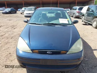 2003 Ford Focus SE with VIN 1FAFP34P23W313184, listed as a IAAI auction lot 42684410 with 77,248 mi miles and . Bid and sale history available at DreamBid. Image 6.