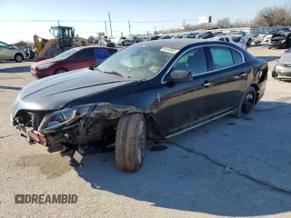 2015 Lincoln MKS with VIN 1LNHL9EK6FG603295, listed as a Copart auction lot 88538065 with 72,738 mi miles and Salvage title. Bid and sale history available at DreamBid. Image 1.