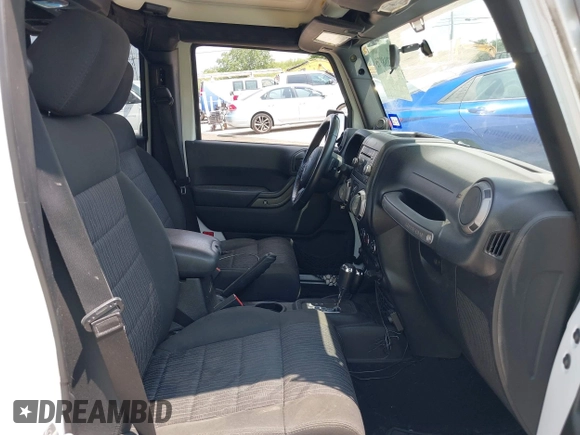 2012 Jeep Wrangler Unlimited Sport with VIN 1C4BJWDG7CL273102, listed as a IAAI auction lot 42288975 with 155,153 mi miles and . Bid and sale history available at DreamBid. Image 5.