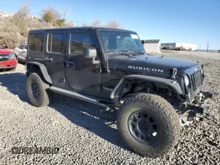 2018 Jeep Wrangler Unlimited Rubicon Recon with VIN 1C4BJWFGXJL899785, listed as a Copart auction lot 50102975 with 114,926 mi miles and Salvage Title. Bid and sale history available at DreamBid. Image 4.