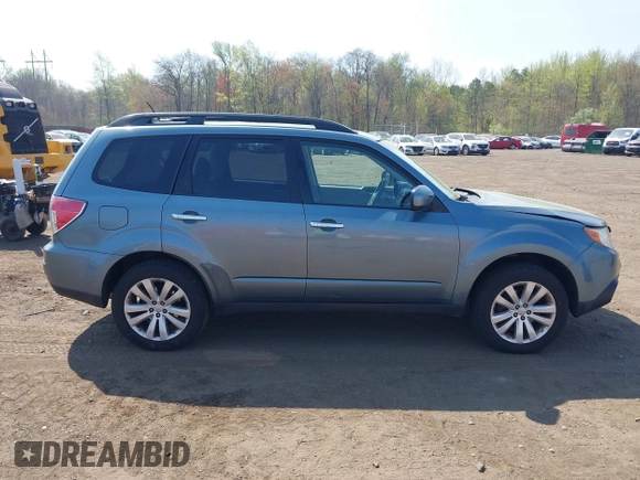 2011 Subaru Forester X Limited with VIN JF2SHAEC9BH713866, listed as a IAAI auction lot 42114557 with 148,404 mi miles and . Bid and sale history available at DreamBid. Image 13.