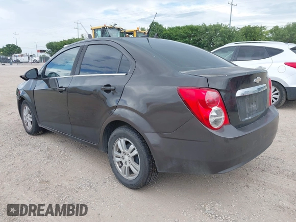 2013 Chevrolet Sonic LT with VIN 1G1JC5SH7D4236146, listed as a IAAI auction lot 39859991 with 135,006 mi miles and . Bid and sale history available at DreamBid. Image 3.