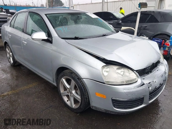 2009 Volkswagen Jetta S z VIN 3VWJZ71K29M148712, wystawiony jako IAAI lot #41724523 z przebiegiem 112 043 mil mil oraz . Historia ofert i sprzedaży dostępna na DreamBid. Obrazek 1.