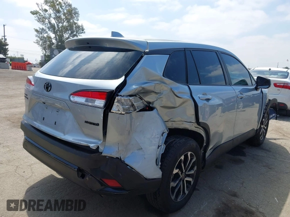 2023 Toyota Corolla Cross Hybrid S with VIN 7MUFBABG1PV014992, listed as a IAAI auction lot 42202656 with 18,913 mi miles and . Bid and sale history available at DreamBid. Image 4.