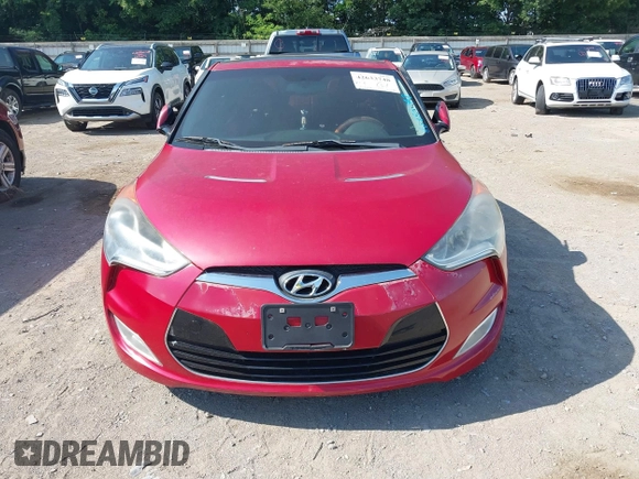 2012 Hyundai Veloster w/Black Int with VIN KMHTC6AD3CU032989, listed as a IAAI auction lot 42633748 with 137,727 mi miles and . Bid and sale history available at DreamBid. Image 6.
