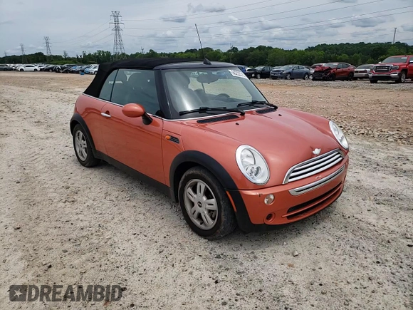 2006 MINI Convertible with VIN WMWRF335X6TF64910, listed as a Copart auction lot 60222215 with 85,761 mi miles and Salvage title. Bid and sale history available at DreamBid. Image 13.