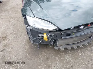 2013 Tesla Model S с VIN 5YJSA1CN1DFP27013, выставлен на аукционе IAAI как лот 42014212 с пробегом 65 858 миль миль и . История ставок и продаж доступна на DreamBid. Изображение 6.