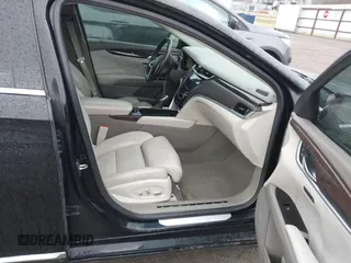 2014 Cadillac XTS Platinum with VIN 2G61W5S84E9291640, listed as a IAAI auction lot 41877867 with 100,462 mi miles and . Bid and sale history available at DreamBid. Image 5.