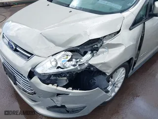 2015 Ford C-Max Hybrid SE with VIN 1FADP5AU5FL120692, listed as a IAAI auction lot 41590616 with 102,381 mi miles. Bid and sale history available at carsss.com. Image 6.