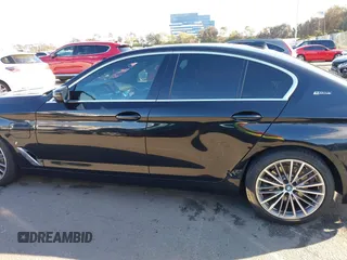 2019 BMW 5 Series 530e iPerformance with VIN WBAJA9C53KB388861, listed as a IAAI auction lot 41621712 with 68,128 mi miles. Bid and sale history available at carsss.com. Image 14.