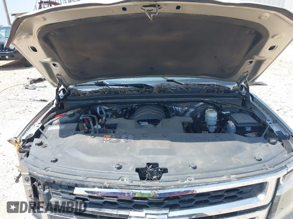 2015 Chevrolet Tahoe LS with VIN 1GNSCAKC9FR294832, listed as a IAAI auction lot 39274877 with 126,932 mi miles and . Bid and sale history available at DreamBid. Image 10.